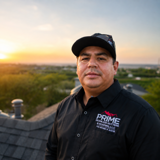 Professional roofer Antonio Silva on rooftop at sunset in San Antonio, Texas, wearing Prime company branded black shirt and cap